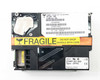 IBM 99F7834 SAA Hard Drive – label view showing part number 99F7834, IBM COMP IEC 950, Type DFHC, manufactured in Singapore, dated 06/1996
