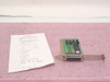 Magitronic A-B109 ISA dual parallel printer card shown beside its user's manual on pink anti-static foam