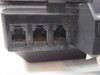 Hypercom T7P-T bottom port detail showing LINE, PHONE, and PIN RJ-11 connector ports