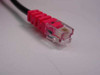Polycom 20071-001 RJ11 connector close-up showing red boot and clear plug contacts