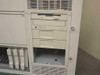 Compaq ProLiant 6000 drive bay area showing 3.5-inch floppy drive, CD-ROM drive, and empty lower bays