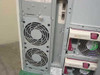 Compaq ProLiant 6000 rear side panel view showing large chassis cooling fans and power supply units