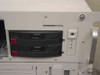 Compaq ProLiant CL1850 front drive bay section showing two CR3500 hot-swap drives installed with red handles and ELMON1 label below