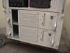Compaq ProLiant CL1850 lower node enclosures front view showing ELMON1 and ELMON2 node bays with optical drives and indicator lights