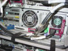 Compaq ProLiant CL1850 internal rear view showing cooling fans, expansion card slots, SCSI connectors, and multi-colored cabling
