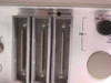HP 78221-OPT 12 controller — rear panel closeup showing Beeper Volume rotary control and three expansion card bays with card edge connectors visible