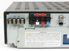 Uniden PC4000 rear panel left section close-up showing M1/M2 speaker binding posts, DC 24V 2.5A wiring block, GND/PULSE/DC6V/SEN terminals, UHF ANT, IR remote port, and attention/patent label