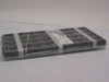 Motorola DSP56001AFE27 DSP IC chips in factory tray — angled side view showing full tray depth