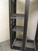 Winsted 45U rack – right column interior showing perforated shelf and rack rail mounting holes