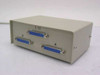 Unbranded 2-way DB25 data transfer switch — rear/side view showing three DB25 25-pin female connectors labeled I/O, A, and B