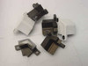 MEC Tech AMAT small mounting bracket and corner bracket components — mixed anodized aluminum and white polymer pieces