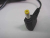 Sony AC-E455 power adapter – close-up of right-angle barrel plug with yellow tip