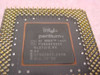 Intel Pentium MMX SL27J FV80503200 processor — close-up of die markings showing FV80503200, SL27J/2.8V, A4 stepping, and date code