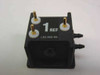 Abbott 1365-05 Reference Electrode — front face showing 1 REF label, four gold pins with white gaskets, and two barbed side ports