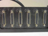 IBM 21F5097 — close view of six DB25 female terminal ports numbered 1 through 6 on breakout block