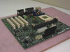 Dell 15JDG Socket 370 Motherboard – angled top view showing PCI expansion slots, ATX power connector, DIMM slots, and Intel chipset