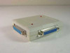 PC Concepts 2-to-1 non-powered parallel interface switch — angled front/side view showing two DB25 female connectors on left end and one DB25 female connector on right end