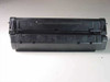 Canon FX-3 black toner cartridge – right side and top view showing cartridge body and molded icons