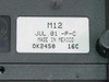 Plantronics M12 Vista amplifier bottom label showing model M12, date code JUL.01-P-C, Made in Mexico, OK2450 16C