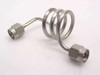 Unbranded stainless steel coiled SMA-male coaxial cable approximately 8 inches, full coil view showing both SMA-male connectors