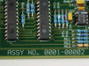 IVS Accuvision 200 SFB board close-up — Assembly No. 0001-00002 silk-screened on PCB, with AD78S-JN op-amp ICs visible in foreground