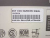 Avaya 102925 label closeup – DEF ECS CARRIER SINGL part number label with barcode and Avaya serial number