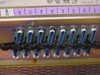 Avaya 102925 rear detail – slots 11 through 18 showing 50-pin Amphenol telco connectors labeled C, with slot numbers