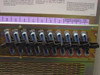 Avaya Definity rear cabinet — Row A connector panel showing slots 1-10 with 50-pin telco (Champ) connectors and Expansion Interface / Tone Clock labels