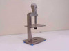 Custom tolerance measurement fixture side view showing full height, vertical column, work table, and base with rubber feet
