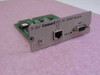 Powerware ConnectUPS-M X-Slot SNMP Module front bracket view showing RJ-45 Ethernet port, DB9 serial connector, and status LEDs