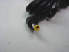 HP F4813A#ABA AC Adapter – close-up of yellow-tip barrel plug DC output connector