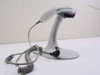 Metrologic MS9520 Voyager handheld laser barcode scanner on stand with coiled PowerLink cable