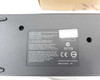 Compaq 135555-001 battery charger bottom label — shows series PP1003A, part number 135555-001, replaces 153991-001, Hewlett-Packard Company, FCC and CE markings, input 16.5V 2.7A