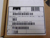 Cisco WIC-1B-U box label showing product number WIC-1B-U, description 1-Port ISDN with NT-1 WAN Interface Rev K0, and special number 800-01834-03