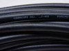 Cable jacket showing 'COMMSCOPE 062x LMR-400 E020052' markings confirming CommScope LMR-400 construction