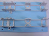 Allen Tel Products GB183A1 Blue Backboard Assembly close-up of upper mounting bracket row and blue panel surface