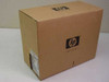 HP CD-Writer Plus C4492B open-box — front-left view of sealed HP cardboard retail box with HP Invent logo