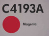 Close-up of HP C4193A toner cartridge box showing C4193A model number and Magenta color label with red dot