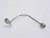 Preformed rigid coaxial cable 202543-002 with SMA-male connectors on both ends, full side view showing curved shape and mounting tab