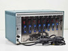 TCL 2110 Multiport Transceiver — rear panel showing 8 DB-9 card slots loaded with 2110-BDM and 2110-ADM cards and AC power cord