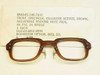 US Military spectacle frame NSN 6540-01-146-7810 brown cellulose acetate front view with DLA contract label showing specs