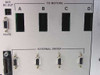 Rear panel detail — To Motors slots A–D, AUX DC Out terminal block, RS-232 port, and four External Driver DB9 connectors