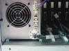 Interior view — rear-mounted cooling fan, internal power wiring harness with J5B and J40 connectors