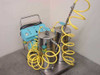 Metro-Line Industries ML1000 cart-mounted oil pump system – full front-left view showing control panel, dual stainless steel tanks, and yellow hose assemblies on wheeled cart