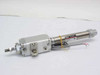 SMC CDLM2L20-100-E pneumatic cylinder — full assembly showing stainless rod body and aluminum actuator block, right-side view