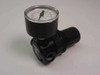 Norgren R07-219RGKA pneumatic regulator with gauge — right-side three-quarter view showing body, gauge, and threaded ports