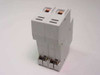 Entrelec GMB 20L circuit breaker rear view showing DIN rail mounting clip and dual copper terminal connections