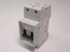 Entrelec GMB 20L 2-pole circuit breaker front view showing toggle switch in OFF position and red Entrelec label