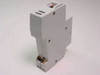 Entrelec GMU 20D circuit breaker side and rear view showing DIN rail clip and screw terminals