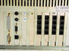 Clarent GC-A032-3 rear I/O panel close-up showing DB-25 parallel port, PS/2 ports, VGA connector, RJ-45 NIC, and analog port card RJ-11 jacks with CE label and serial number sticker